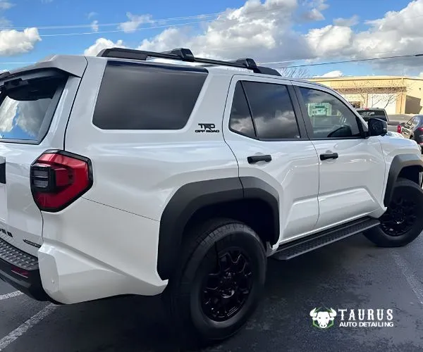 view of a white Toyota 4Runner SUV showcasing a clean paint finish